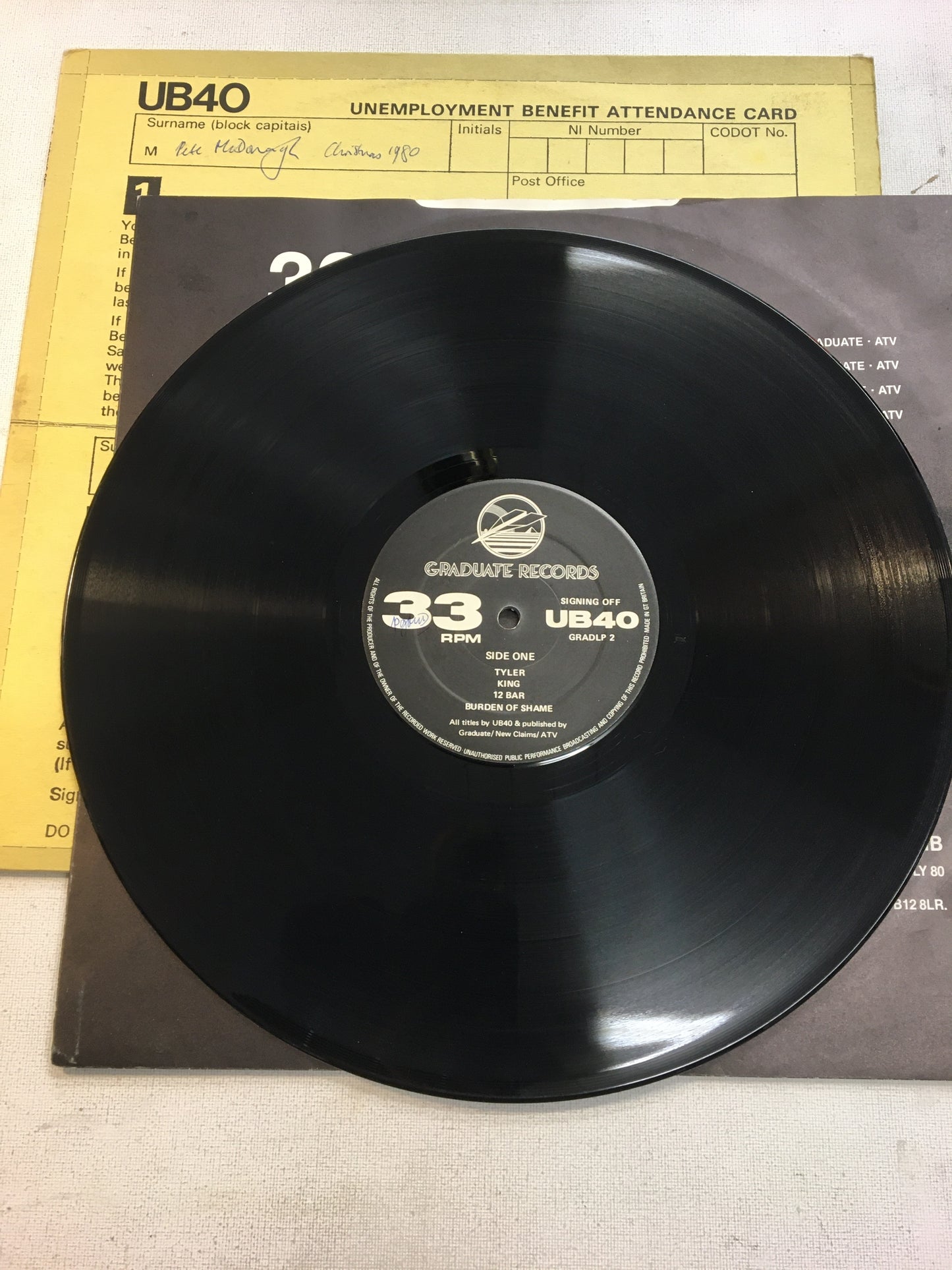 UB40 LP + 12” ; SIGNING OFF