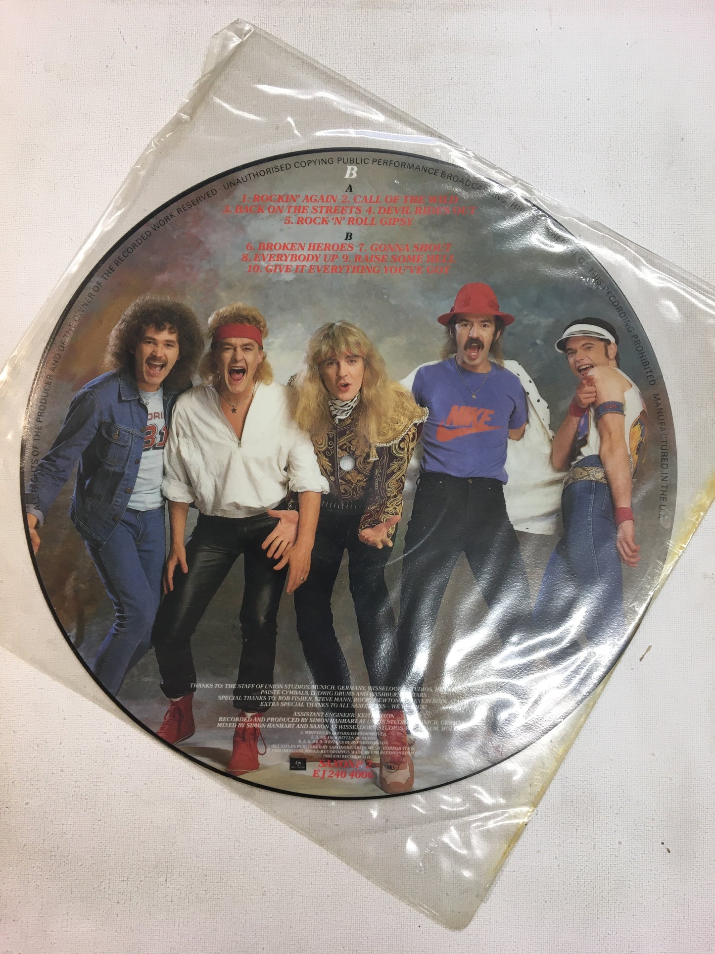SAXON 12” PICTURE DISC ; INNOCENCE IS NO EXCUSE